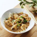 Pork Dumplings with Spicy Peanut Sauce