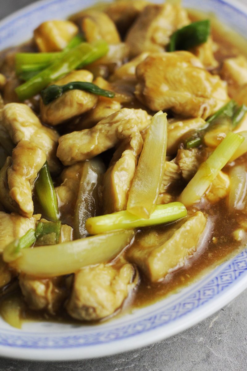 Close-up of chicken and onions stir-fry.