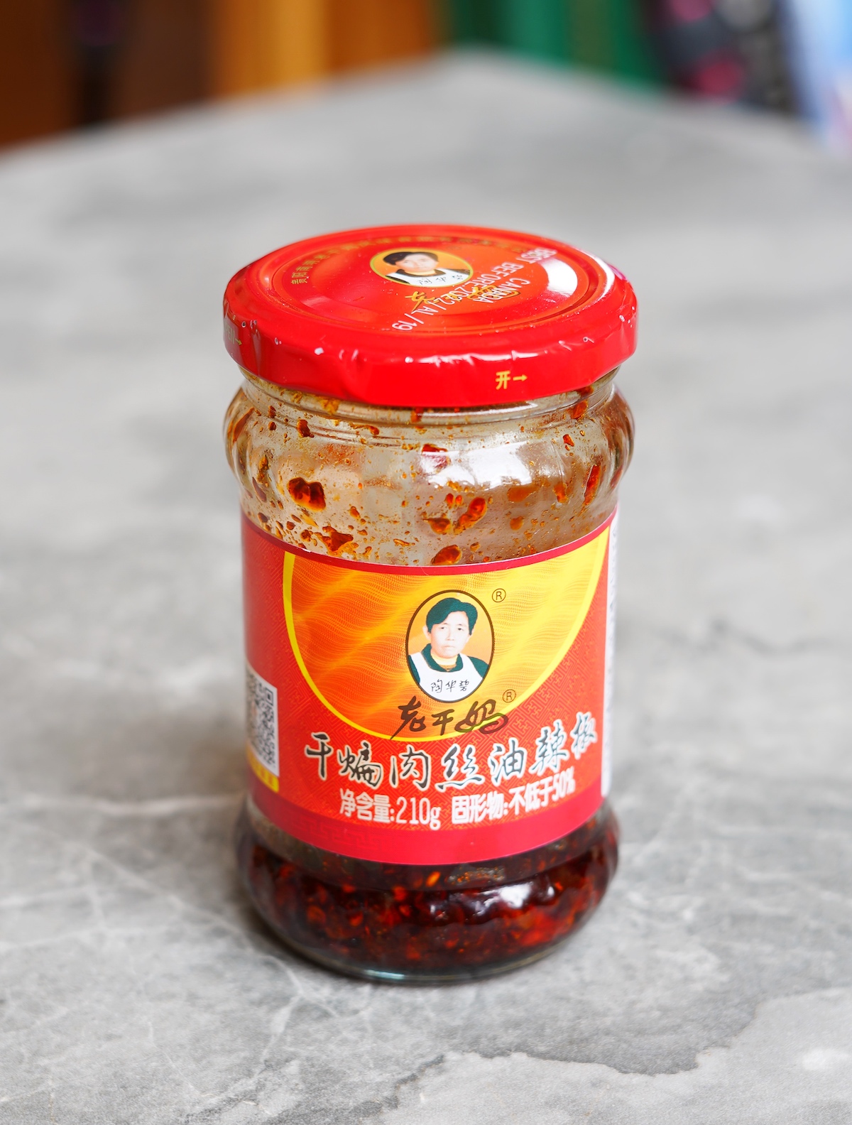 A bottle of Lao Gan Ma chili crisp hot oil.