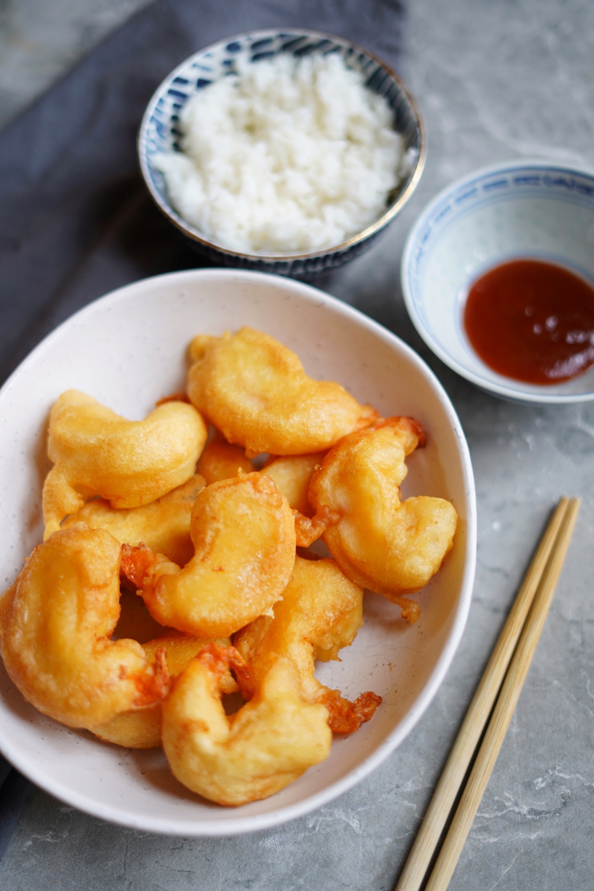 A bowl of airy and light battered shrimps.