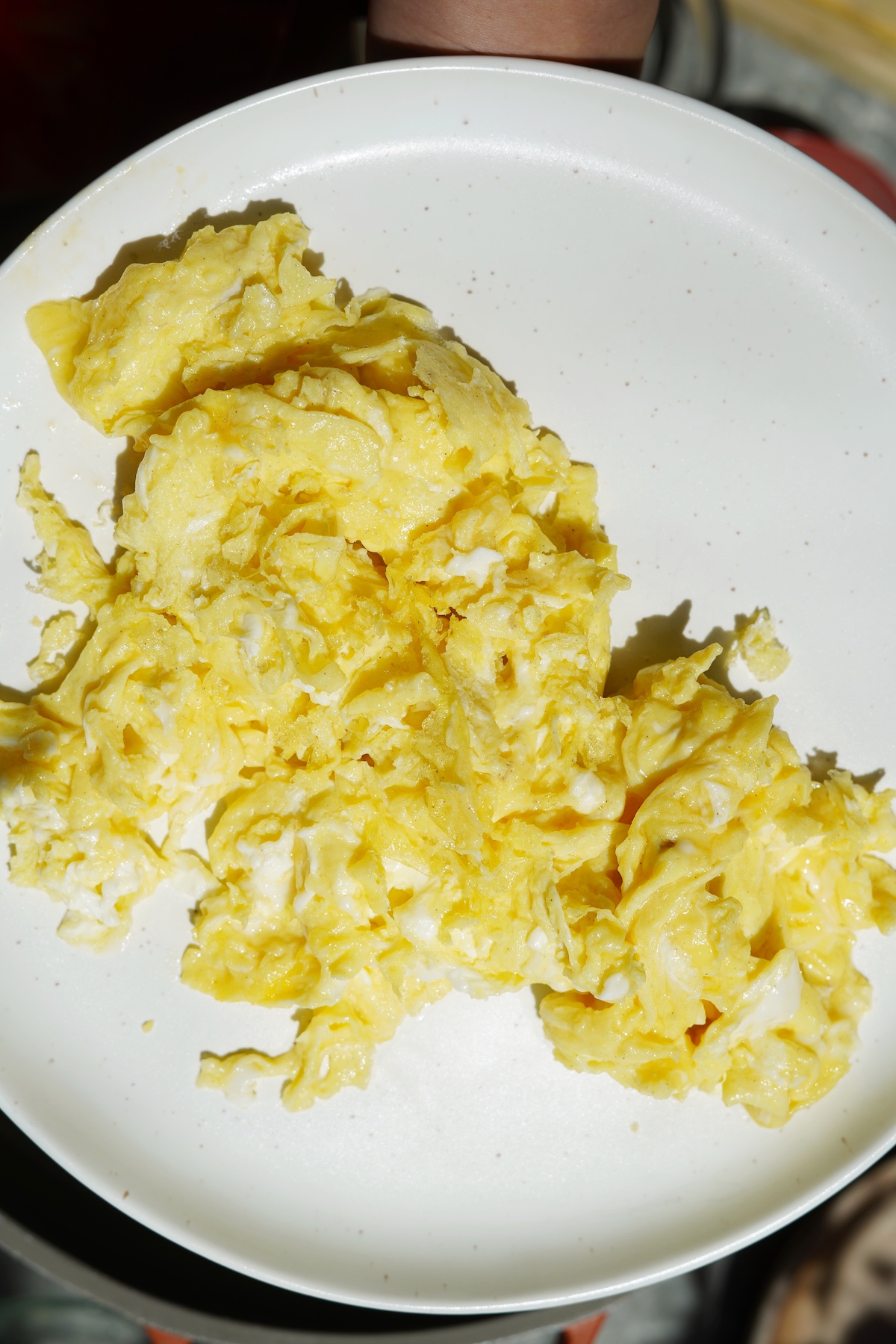 Plate of scrambled eggs.