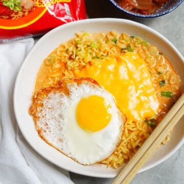 Overview of Korean cheese ramen in a bowl.